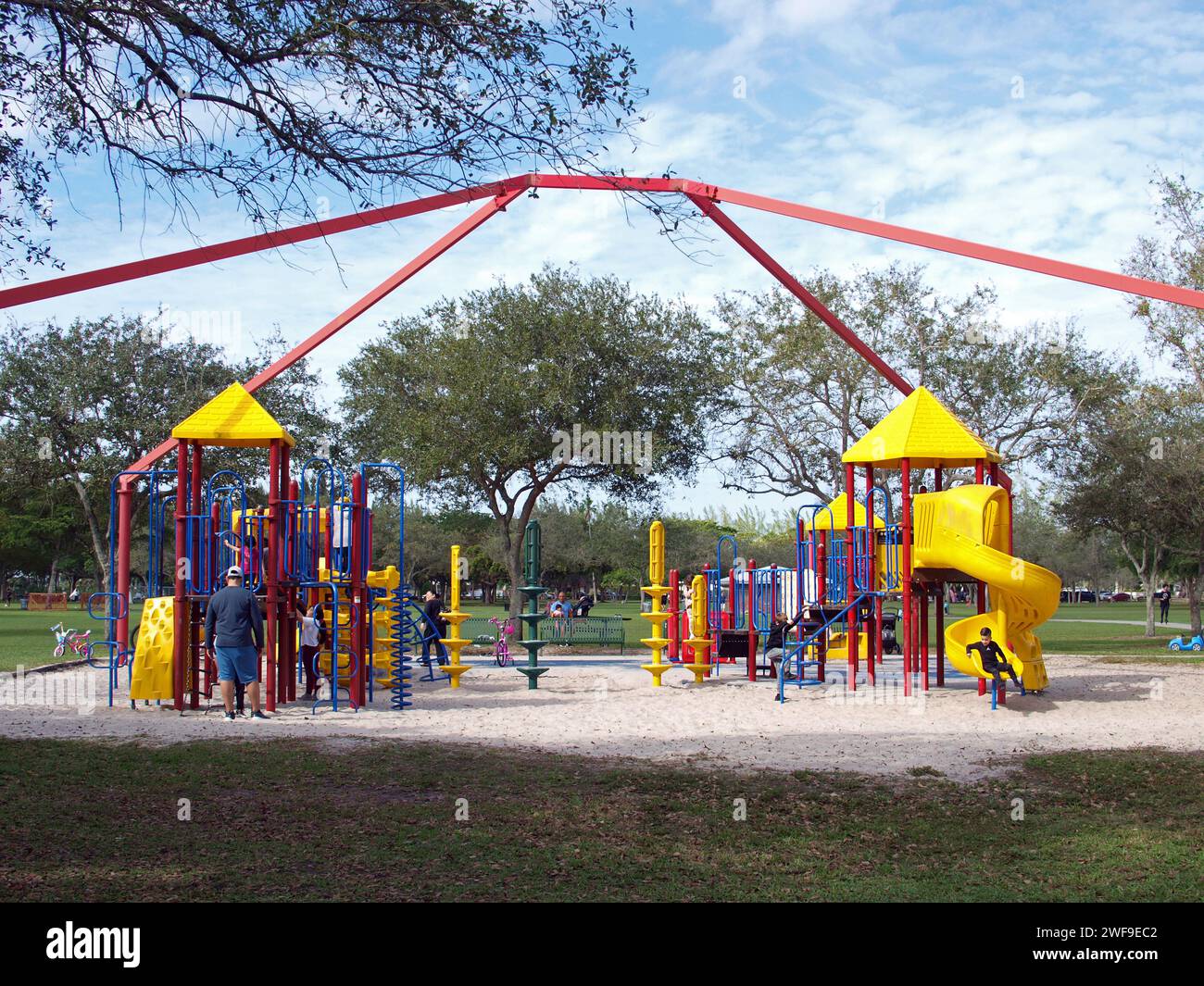 Miami, Florida, United States - January 20, 2024: Children and parents playing in a park. Stock Photo