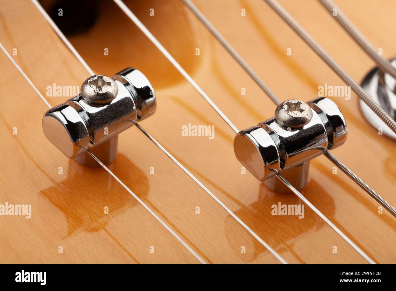 guitar string retainer macro closeup Stock Photo