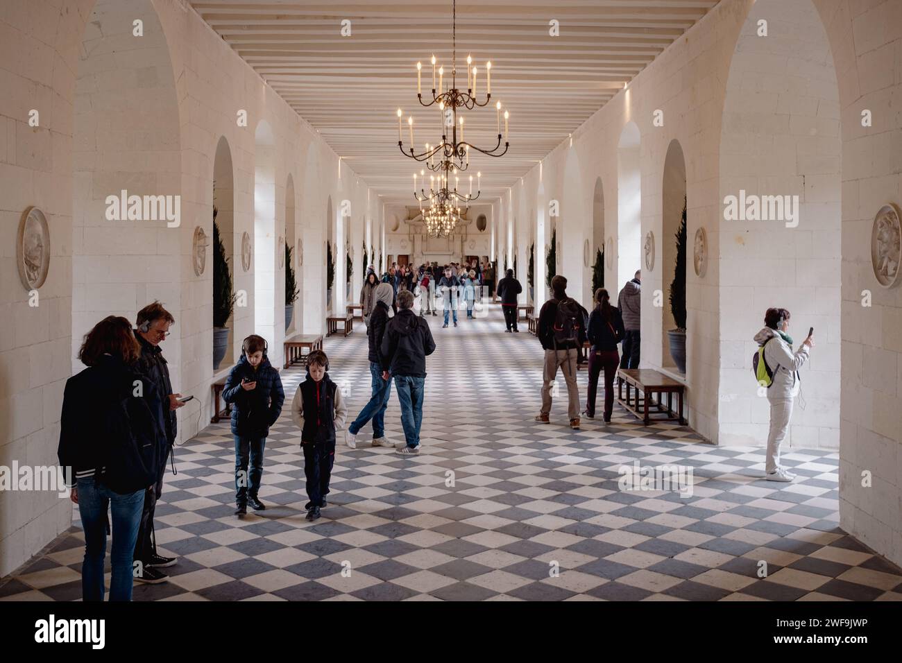 Chenonceau, France - April 15, 2023: Interior of the Chenonceau castle with people. No one is looking at the camera Stock Photo
