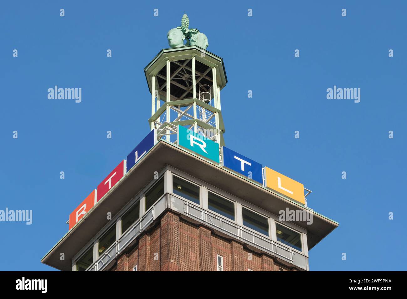 Trade fair tower with the logos of RTL Radio Tele Luxemburg at the headquarters of the private broadcaster in Cologne's Deutz district. Stock Photo