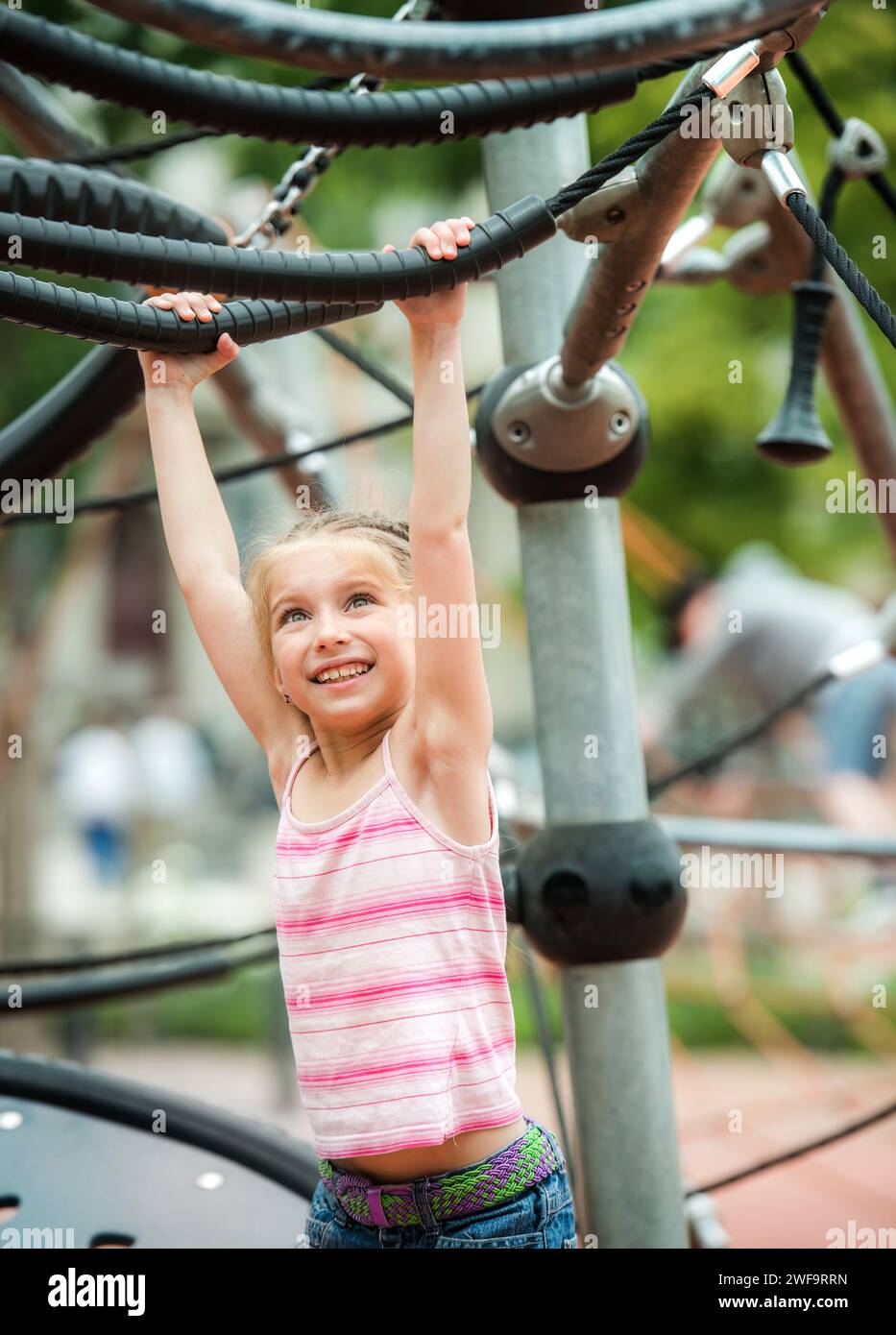 Happy cute smiling little girl playing at the playground outdoor Stock ...