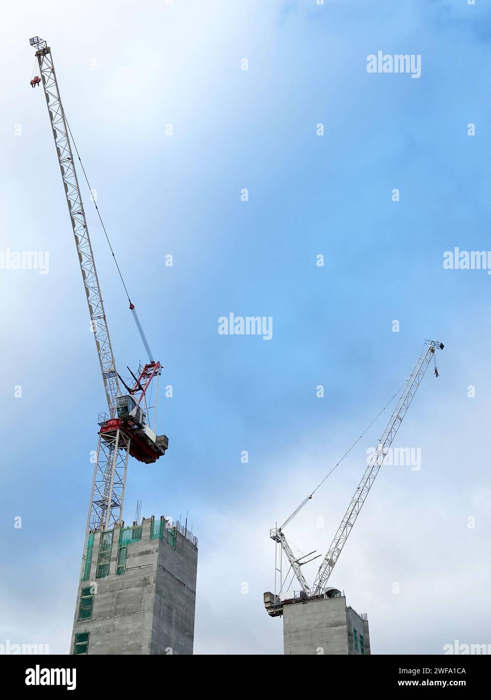 Tower Cranes At New High Rise Apartment Development During Construction Photo Inspiration
