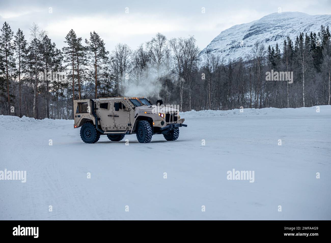 U.S. Marines with Combat Logistics Battalion (CLB) 6, Combat Logistics Regiment 2, 2nd Marine Logistics Group, conduct steering drills using a Joint Light Tactical Vehicle during a slippery road training course as part of Marine Rotational Forces Europe (MRF-E) 24.1 in Setermoen, Norway, Jan. 20, 2024. CLB-6 is in Norway as part of MRF-E which focuses on regional engagements throughout Europe by conducting various exercises, arctic cold-weather and mountain warfare training, and military-to-military engagements, which enhance overall interoperability of the U.S. Marine Corps with allies and pa Stock Photo