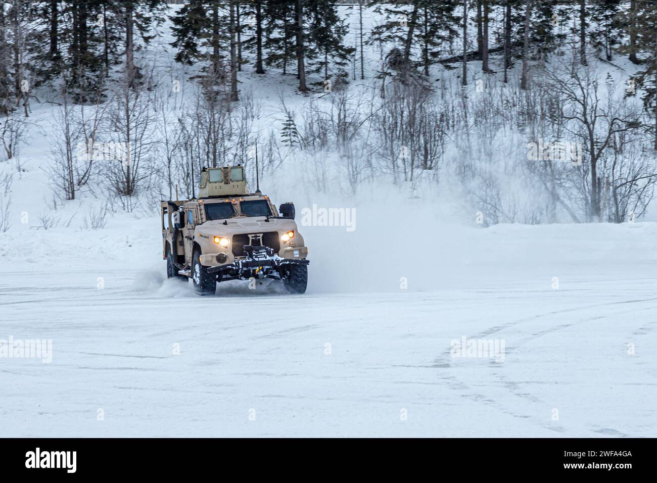 U.S. Marines with Combat Logistics Battalion (CLB) 6, Combat Logistics Regiment 2, 2nd Marine Logistics Group, conduct braking drills using a Joint Light Tactical Vehicle during a slippery road training course as part of Marine Rotational Forces Europe (MRF-E) 24.1 in Setermoen, Norway, Jan. 20, 2024.  CLB-6 is in Norway as part of MRF-E which focuses on regional engagements throughout Europe by conducting various exercises, arctic cold-weather and mountain warfare training, and military-to-military engagements, which enhance overall interoperability of the U.S. Marine Corps with allies and pa Stock Photo