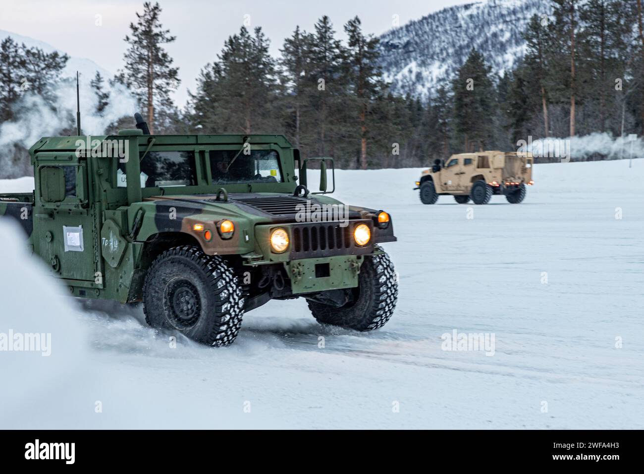 U.S. Marines with Combat Logistics Battalion (CLB) 6, Combat Logistics Regiment 2, 2nd Marine Logistics Group, conduct braking drills using an M1123 Humvee during a slippery road training course as part of Marine Rotational Forces Europe (MRF-E) 24.1 in Setermoen, Norway Jan. 20, 2024.  CLB-6 is in Norway as part of MRF-E which focuses on regional engagements throughout Europe by conducting various exercises, arctic cold-weather and mountain warfare training, and military-to-military engagements, which enhance overall interoperability of the U.S. Marine Corps with allies and partners. (U.S. Ma Stock Photo