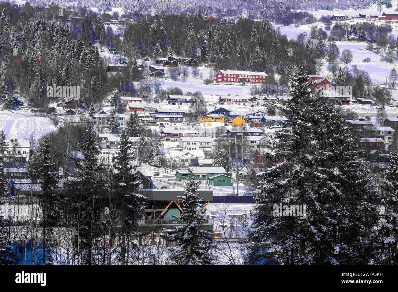 Geilo, Viken, Norway. 17th Nov, 2023. Panoramic view of the city of Gelio seen from one of the carriages of a train that covers the Oslo - Bergen route. The Bergen train route, known as Bergensbanen, is a rail experience that offers travelers a scenic journey through Norway's most breathtaking landscapes. The rail line provides a connection to the Nordic wilderness as the train crosses high plateaus, fjords, crosses rivers and offers breathtaking panoramas. The trains offer on-board amenities, including restaurant cars where passengers can enjoy Norwegian food and drinks while watching the Stock Photo