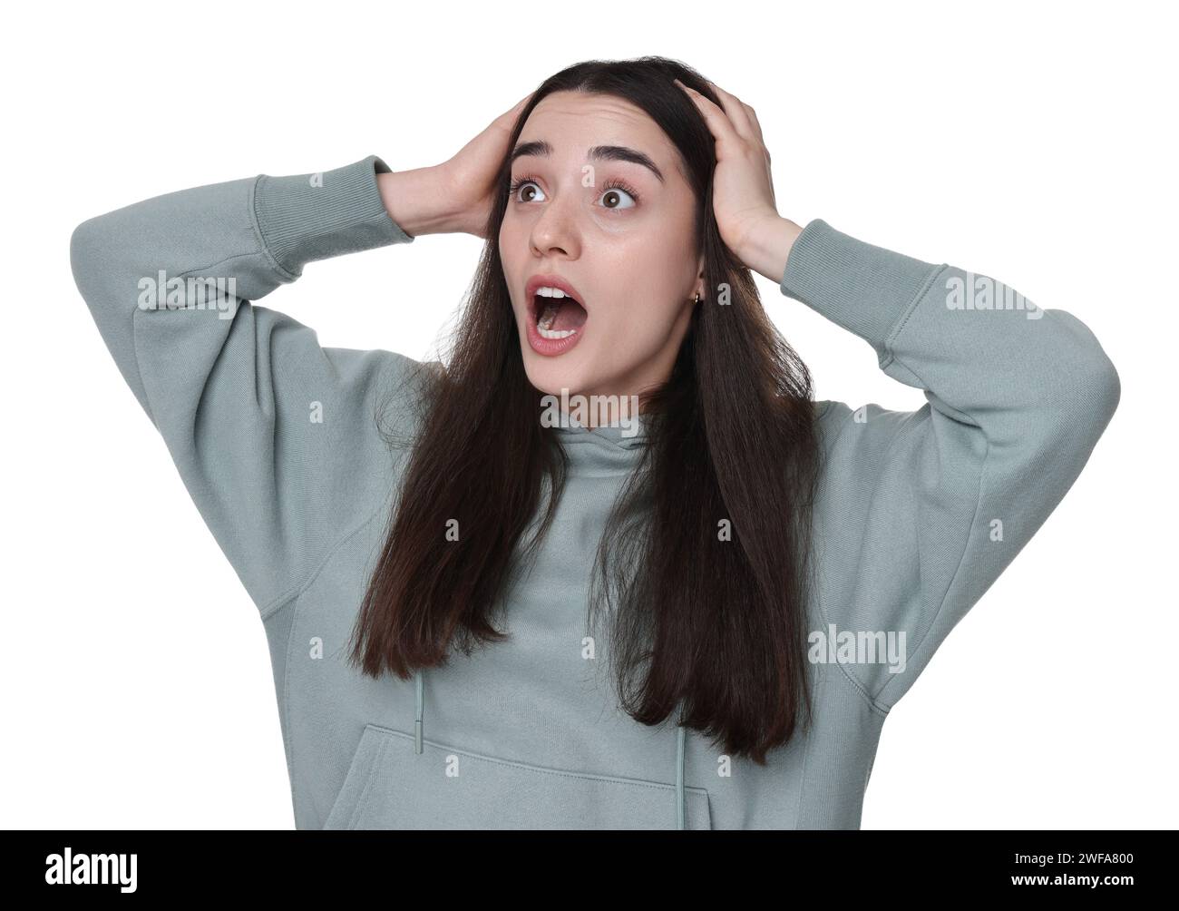 Portrait of surprised young woman on white background Stock Photo - Alamy