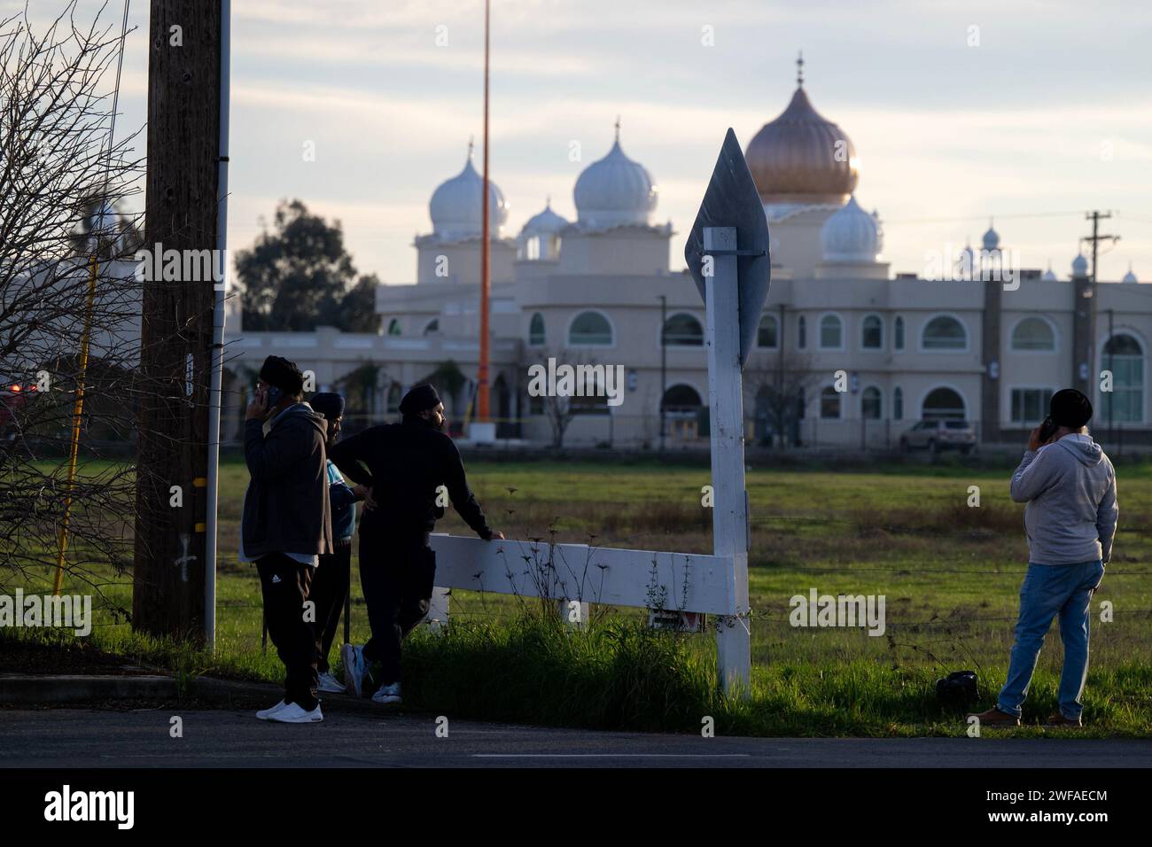 Sacramento, Ca, USA. 29th Jan, 2024. Temple members watch firefighters