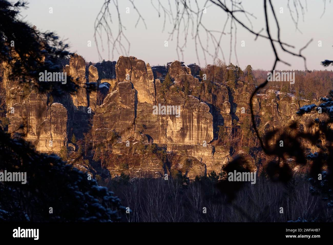 View from the Rauenstein to the Bastei rocks, winter evening, Saxony, Germany Stock Photo