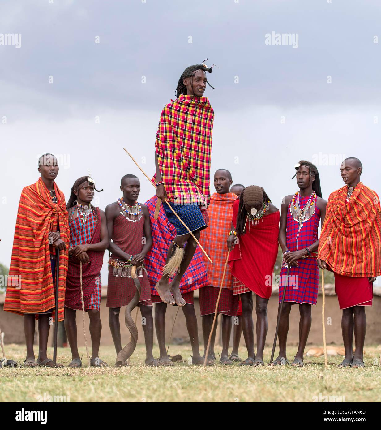 Maasai people preforming the traditional jumping dance in a Maasai village in Maasai Mara, Kenya Stock Photo