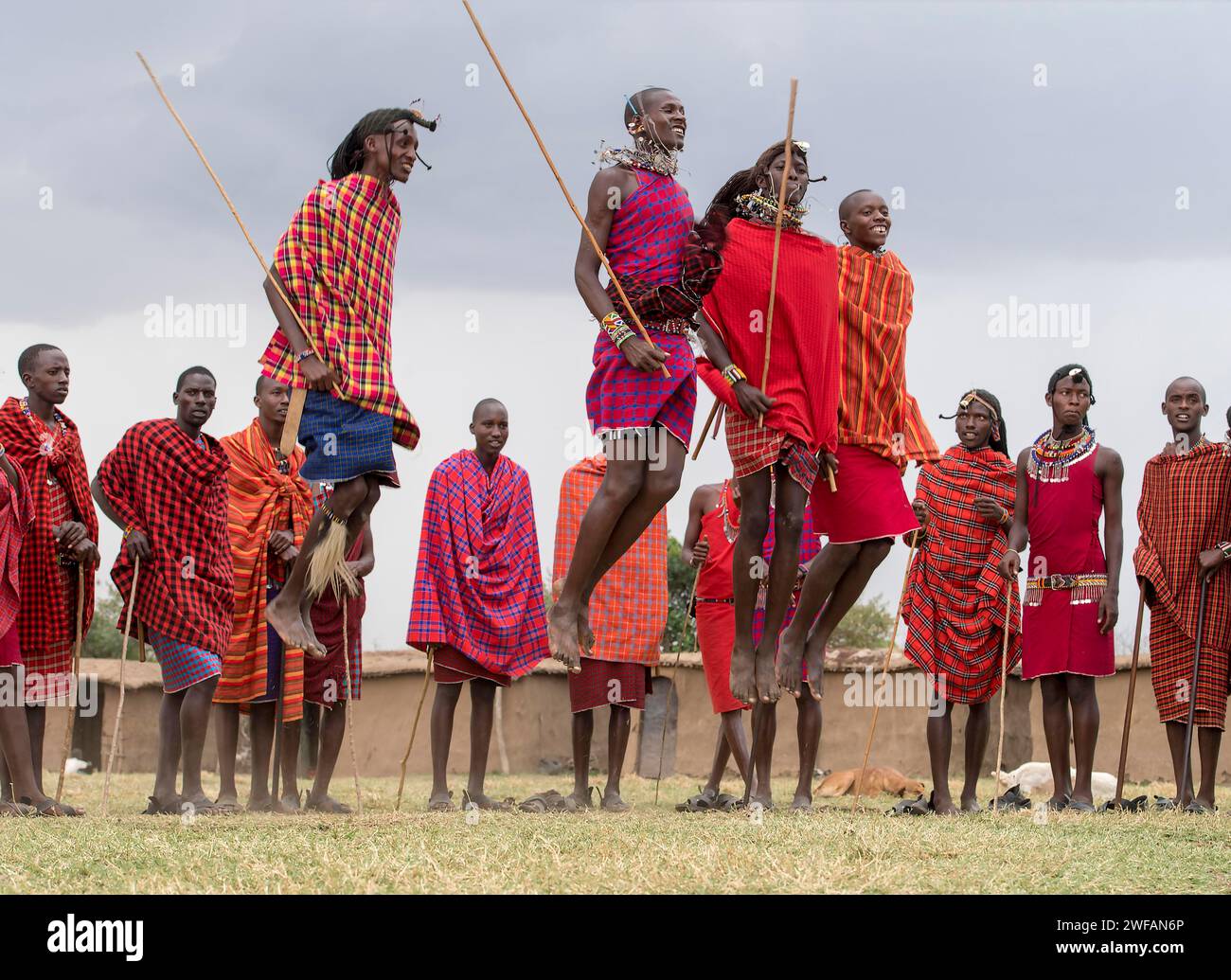 Maasai people preforming the traditional jumping dance in a Maasai village in Maasai Mara, Kenya Stock Photo