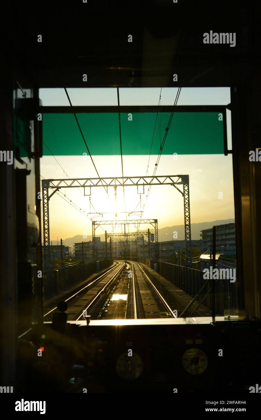 A train journey on the local train from Kobe to Osaka, Japan Stock Photo Alamy
