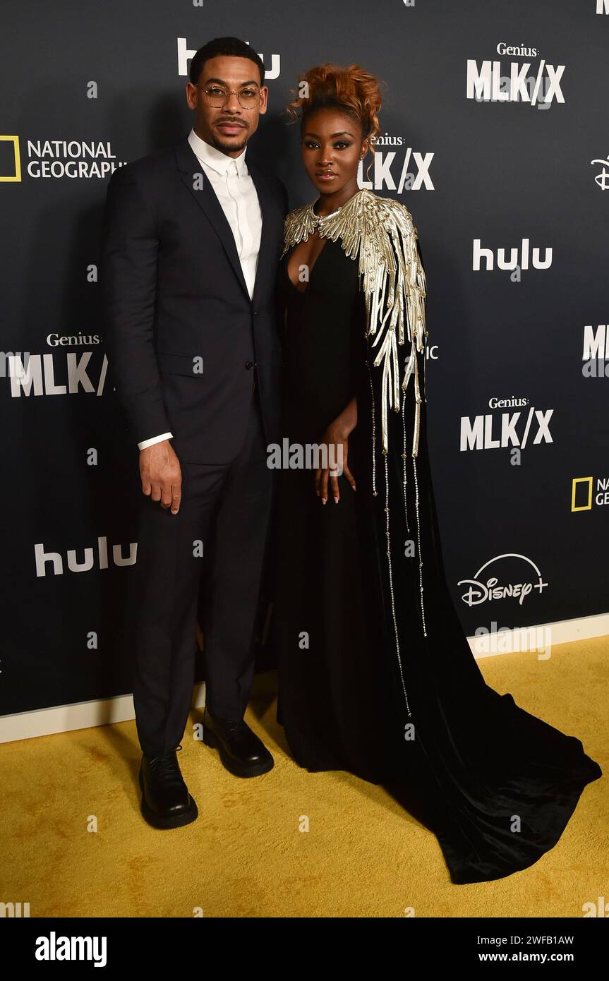 Aaron Pierre, left, and Jayme Lawson arrive at the premiere of "Genius