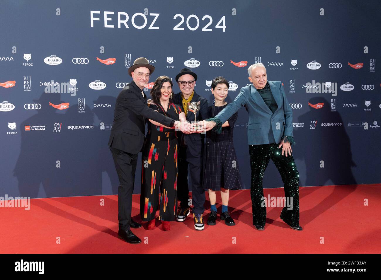 Madrid, Spain. 27th Jan, 2024. Pablo Berger (C), José Luis Ágreda (L), and Alfonso de Vilallonga (R) winners of the award for best comedy film for 'Robot Dreams', pose in the press room during Feroz Awards 2024 at Palacio Vistalegre Arena in Madrid. Credit: SOPA Images Limited/Alamy Live News Stock Photo