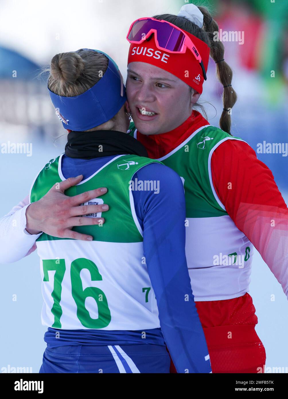 Pyeongchang, South Korea. 30th Jan, 2024. Ilaria Gruber (R) of Switzerland hugs Nelli-Lotta Karppelin of Finland after the Women's 7.5km Classic of Cross-Country Skiing event at the Gangwon 2024 Winter Youth Olympic Games in Pyeongchang, South Korea, Jan. 30, 2024. Credit: Hu Huhu/Xinhua/Alamy Live News Stock Photo