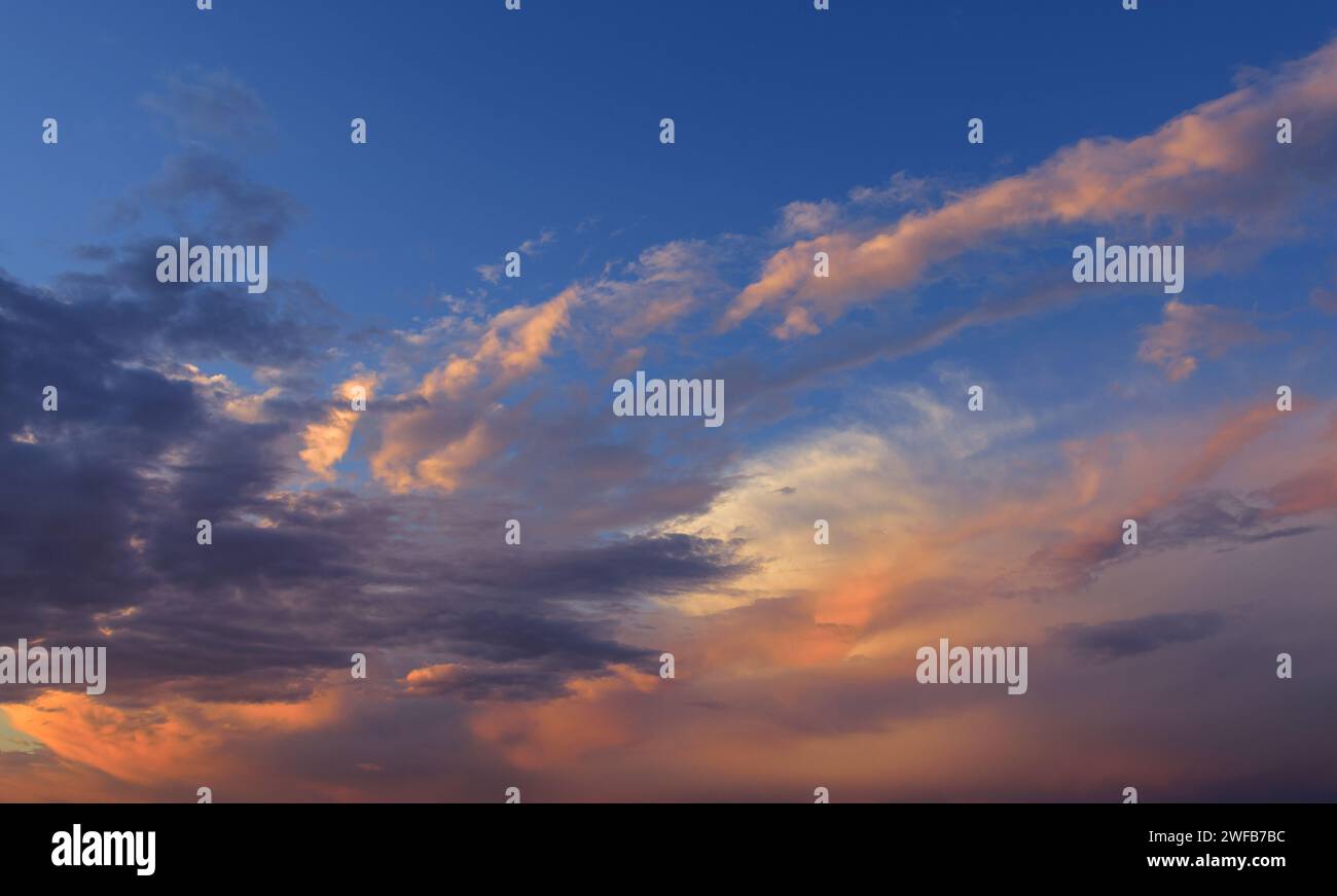 Sunset sky with orange clouds. Nature background Stock Photo - Alamy