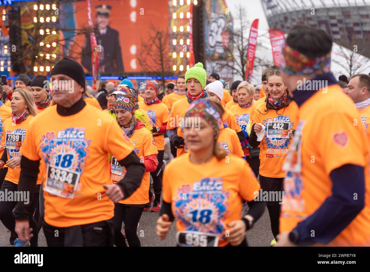 In the photo we see the participants of the Count with Diabetes Run during the 32nd final of charity action of the Great Orchestra of Christmas Charity Foundation Wielka Orkiestra Swiatecznej Pomocy - WOSP in Polish on January 28, 2024 in Warsaw, Poland. The Great Orchestra of Christmas Charity is the biggest Polish private charity organisation, which each year in January since 1992, collects money to provide financial aid for the Polish public health care system. According to initial reports in 2024 the Orchestra gathered at least 175 million zloty ca. 43 million US dollars. During over 30 ye Stock Photo