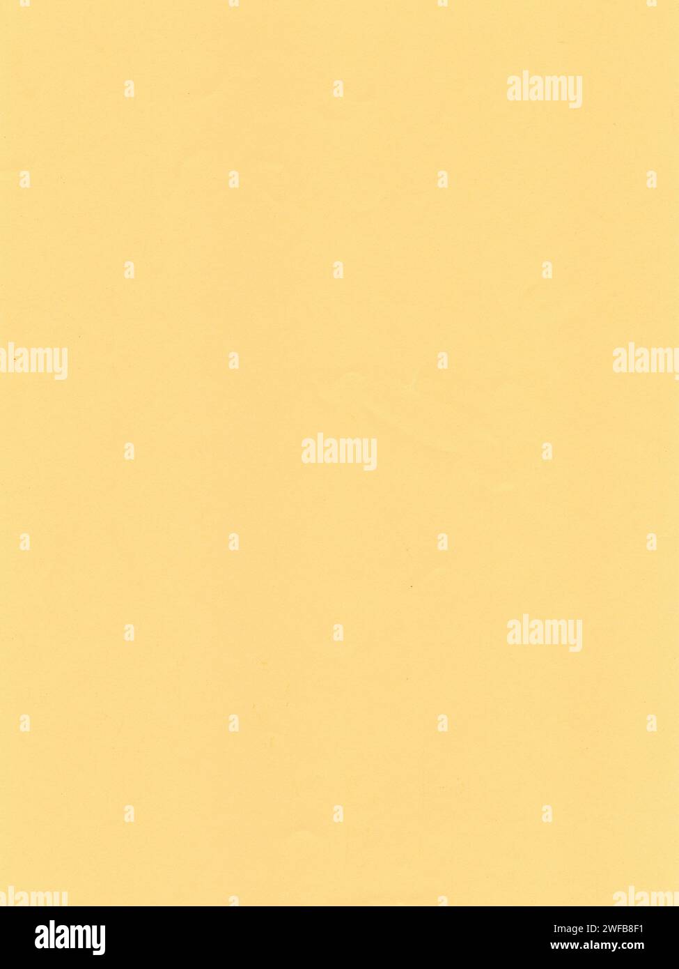 Texture of colored paper, surface of the light yellow sheet of paper Stock Photo