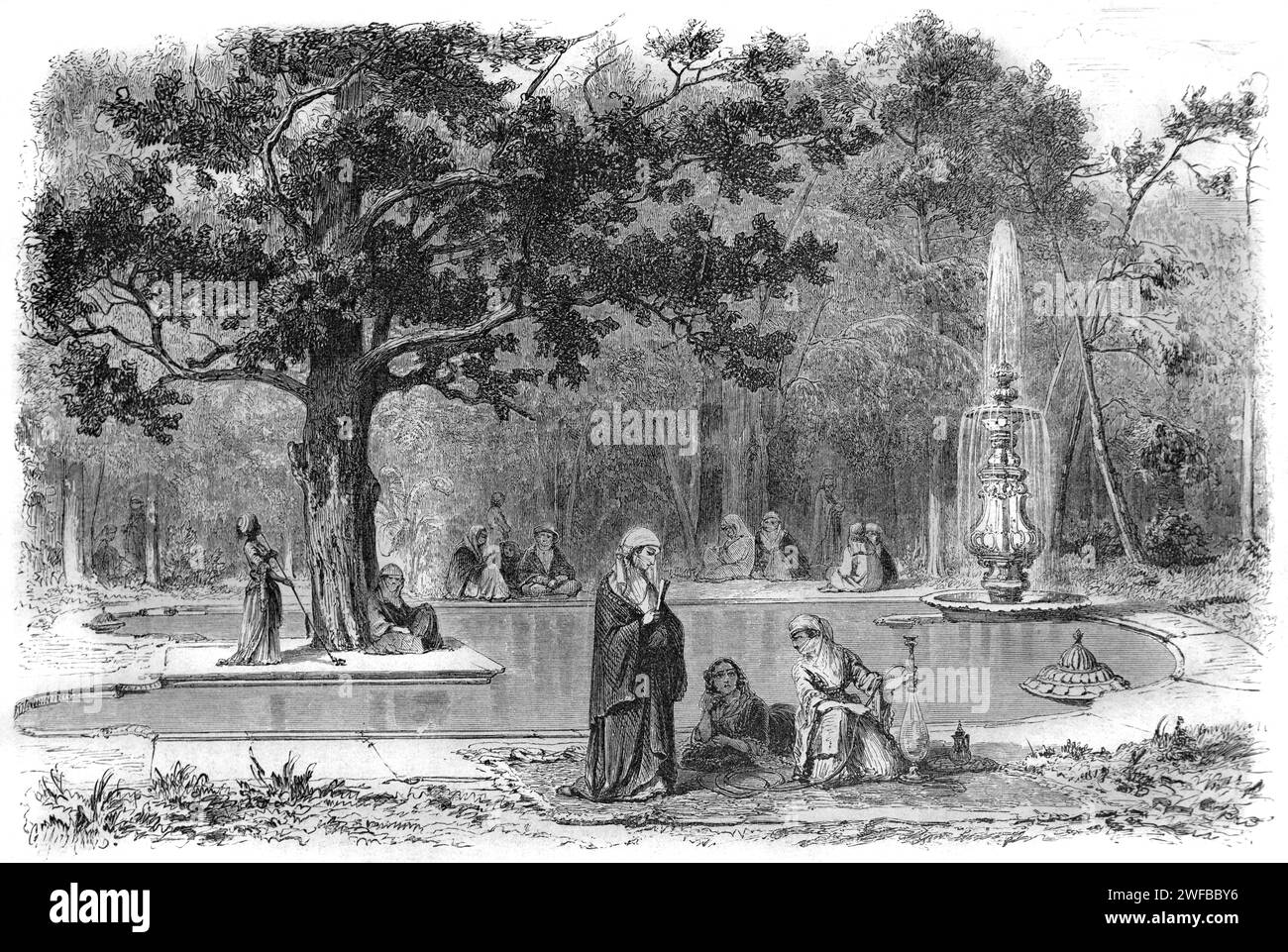 Turkish Ottoman Women from the Harem of Topkapi Palace Gather Round the Marble Fountain, Lime Tree, and Gardens of the Ihlamur Palace, a former Imperial Summer Pavilion, formerly known as Flamour Kiosk in Istanbul Turkey. Vintage or Historical Engraving or Illustration 1863 Stock Photo