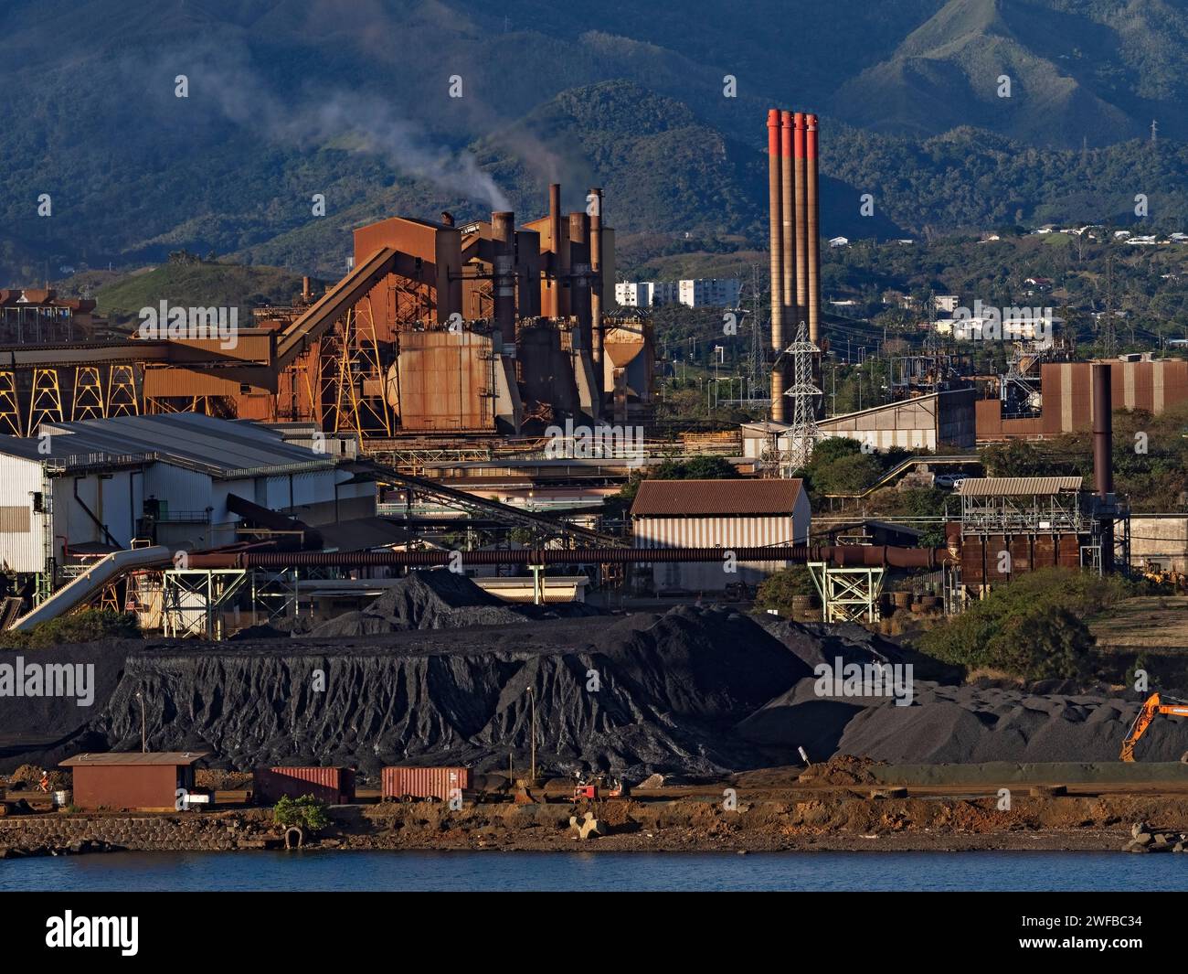 Mining Industry /   SLN-Eramet Nickel Ore Smelting  in the Port of Noumea, New Caledonia. Stock Photo