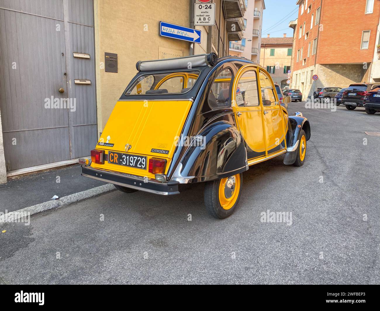 Cremona, Italy - June 25 2023 Citroen 2cv Charleston limited edition black yellow 40 anniversary parked in the street Stock Photo