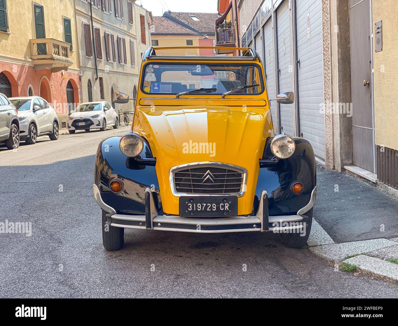 Cremona, Italy - June 25 2023 Citroen 2cv Charleston limited edition black yellow 40 anniversary parked in the street Stock Photo