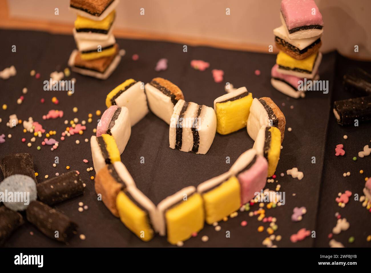 Heart shape made out of liquorice allsorts, a heart of sweets Stock