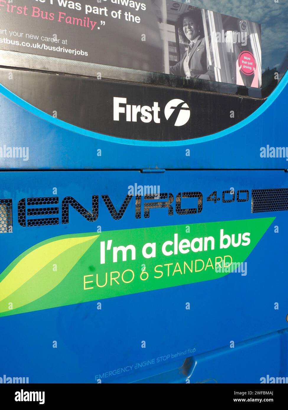 Blue First bus in Bath, Somerset showing 'I'm a clean bus' sign with emissions meeting Euro 6 emissions standards Stock Photo
