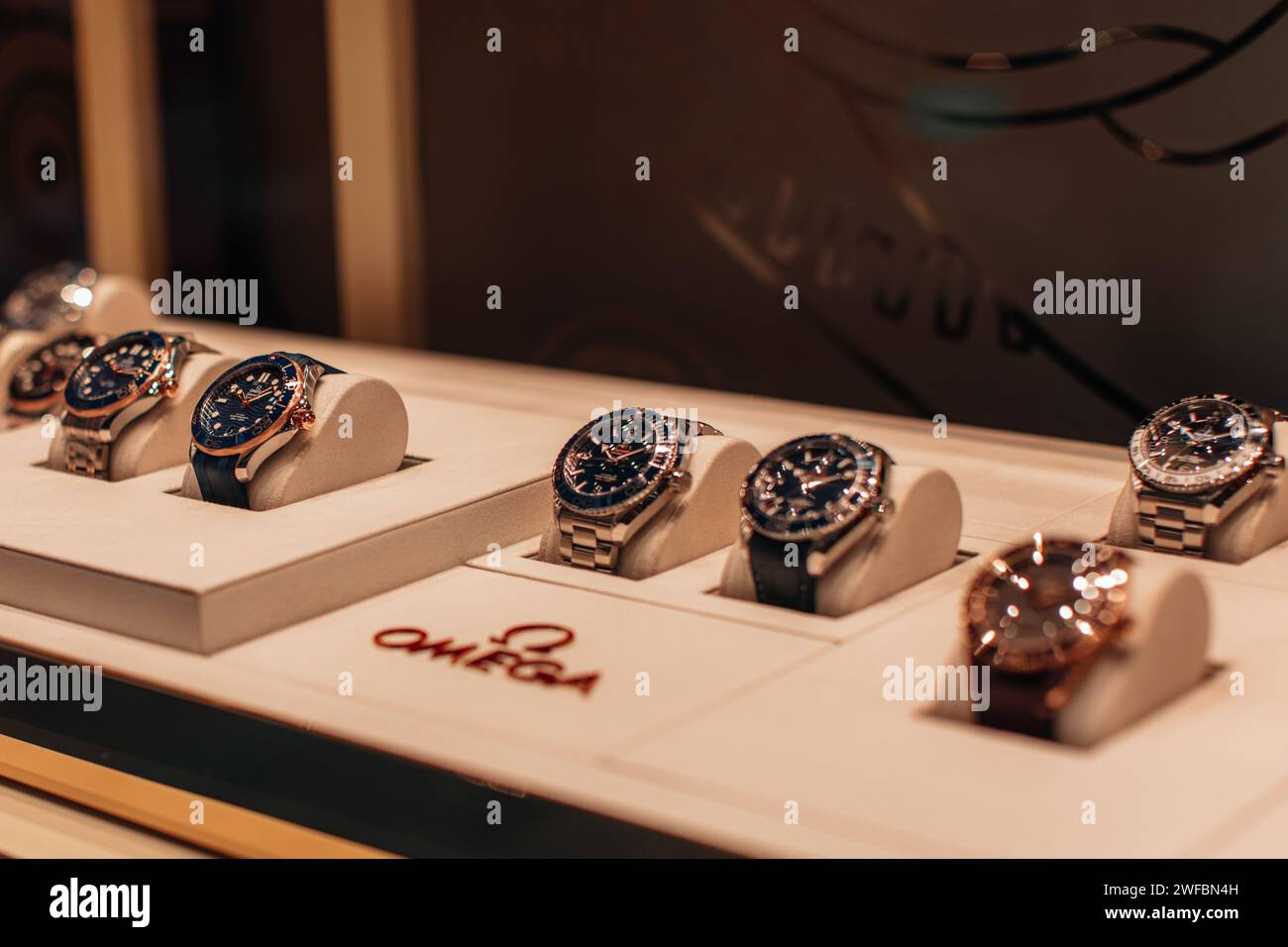 Collection of luxury Omega watches, famous brand shop window display in ...