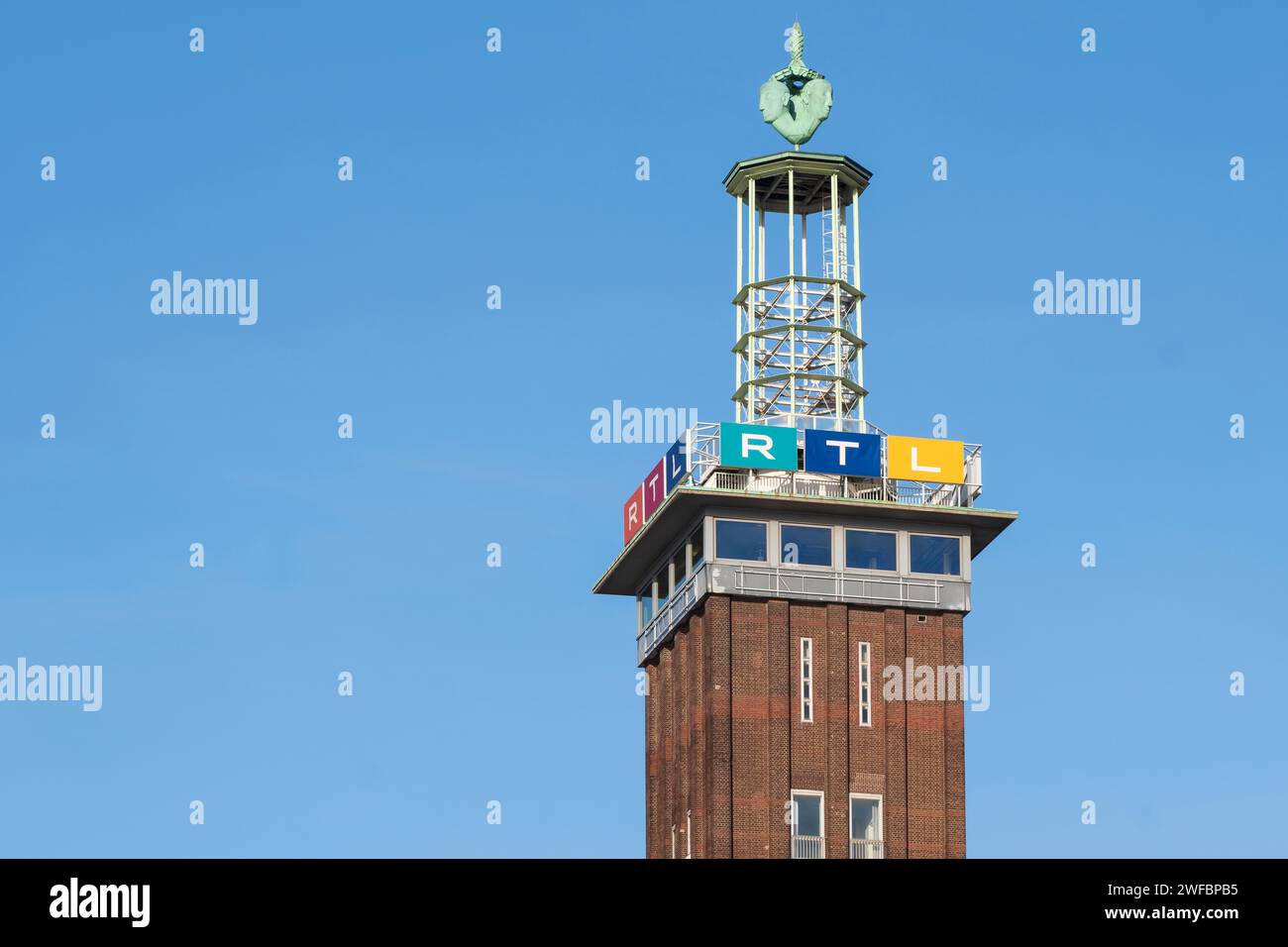 Trade fair tower with the logos of RTL Radio Tele Luxemburg at the headquarters of the private broadcaster in Cologne's Deutz district. Stock Photo