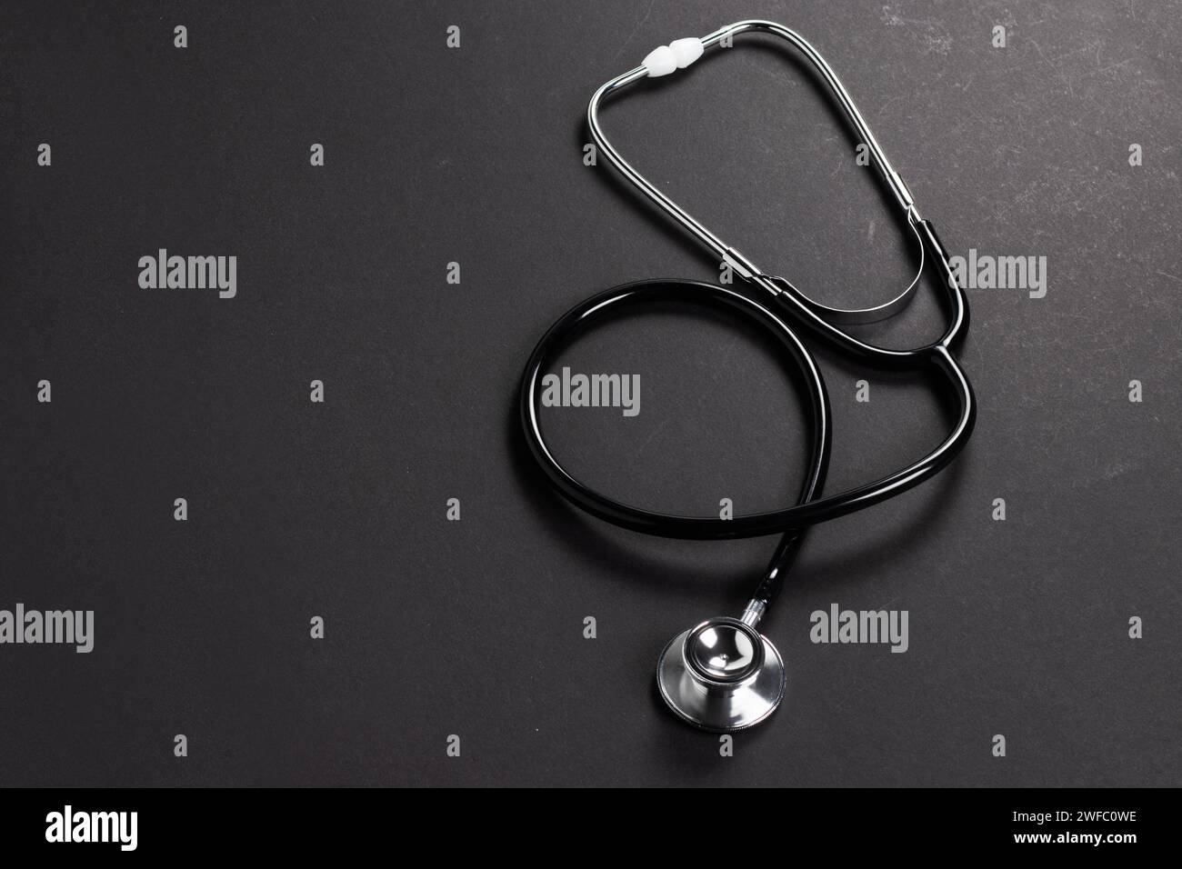 Stethoscope on dark background. healthcare and medical concept