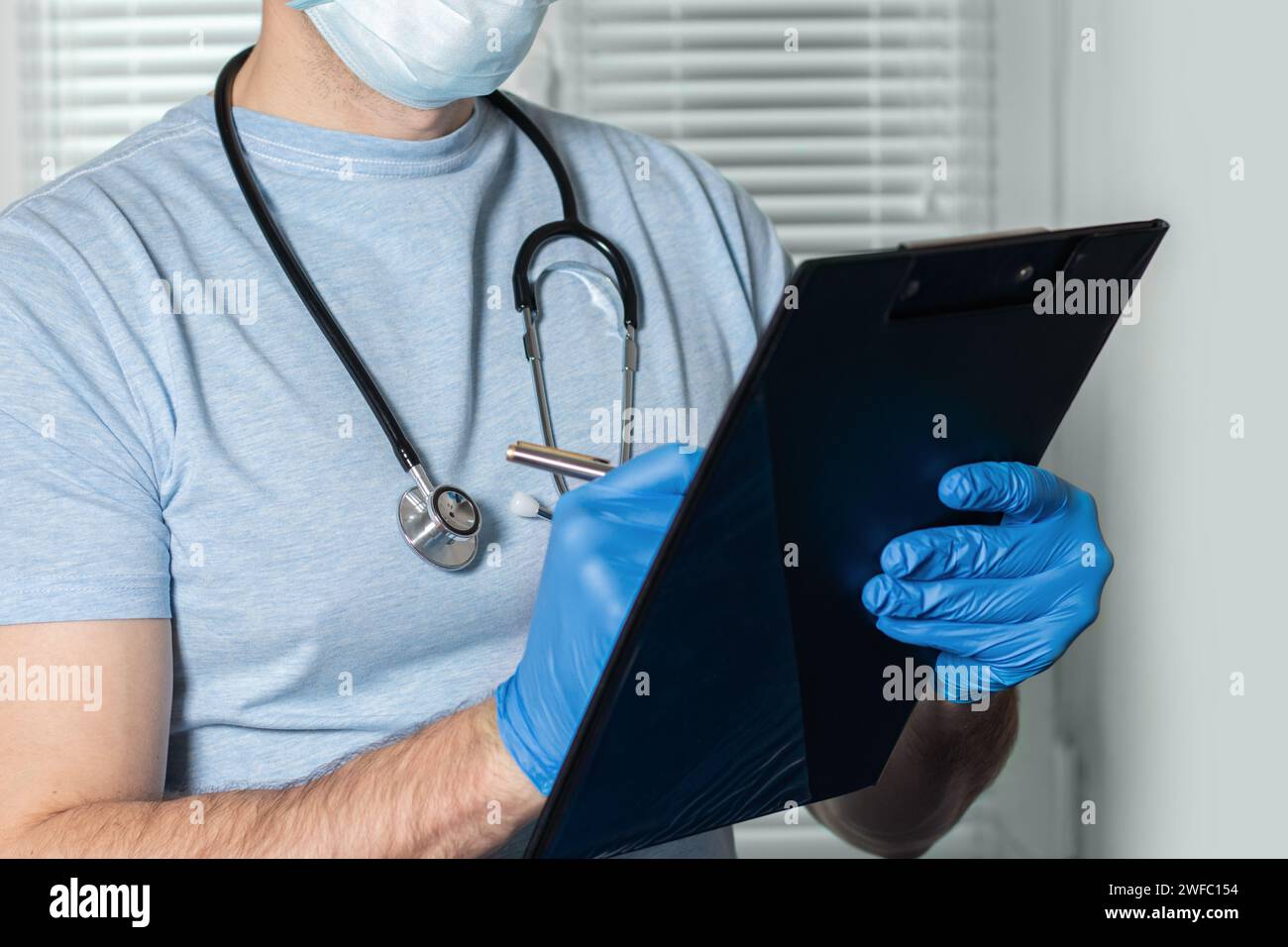 Doctor writing prescription family hi-res stock photography and images ...