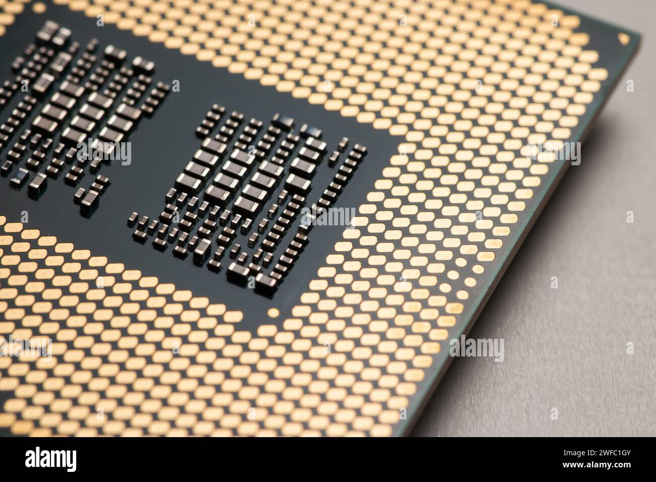 Closeup CPU or Central Processing Unit from motherboard, macro shot microprocessor unit of computer hardware system Stock Photo