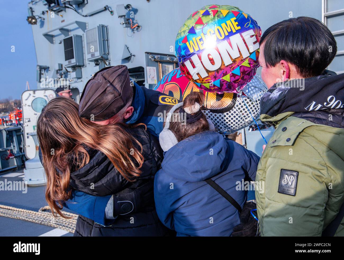 Rostock, Germany. 30th Jan, 2024. A crew member of the corvette