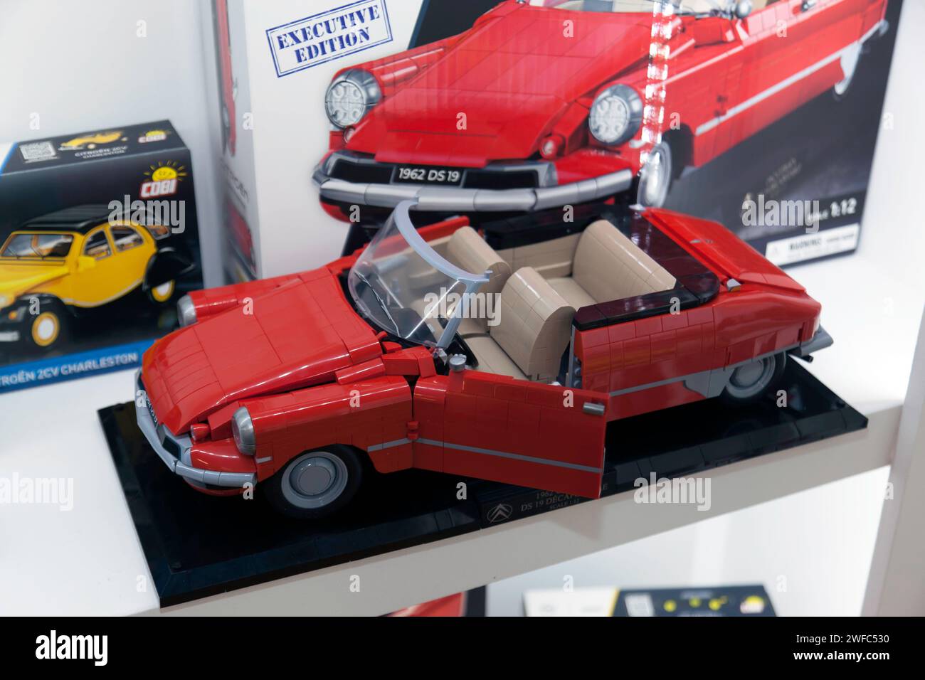 Close-up of a Red, Citroen DS 19 Décapotable 1962 - Executive Edition, on the Cobi Stand, at the 2024 Toy Fair, Olympia, London Stock Photo