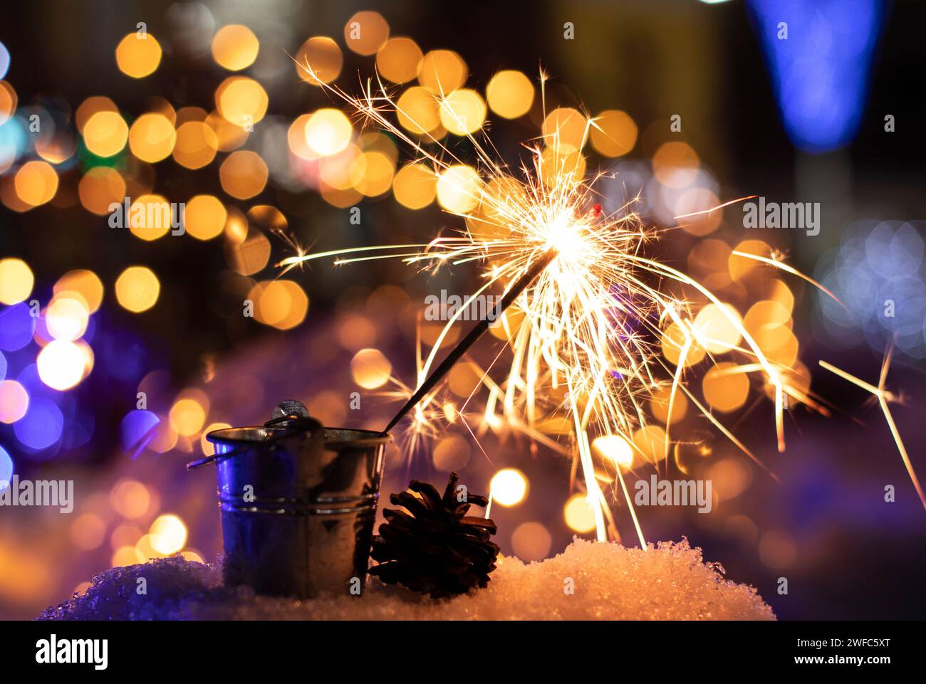 Flames of Bengal fire on the streets of the night city Stock Photo