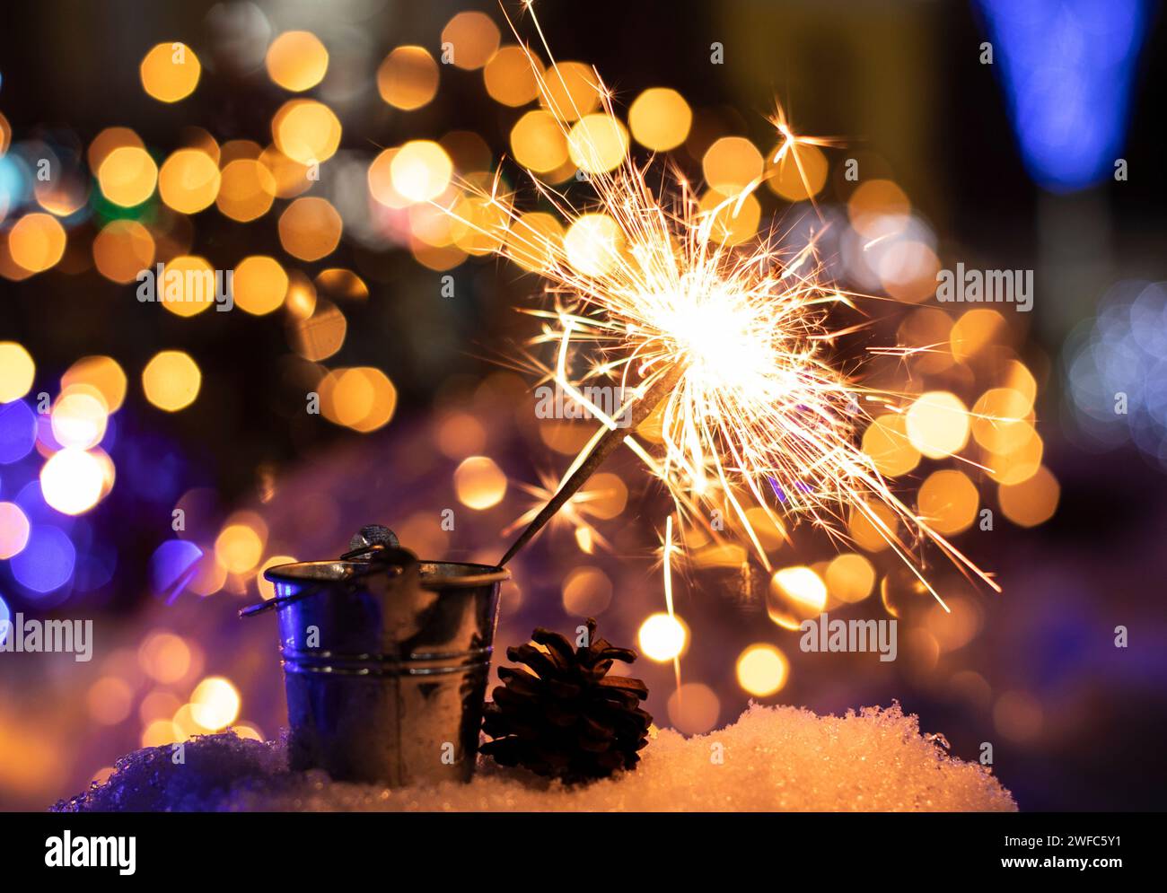 Flames of Bengal fire on the streets of the night city Stock Photo