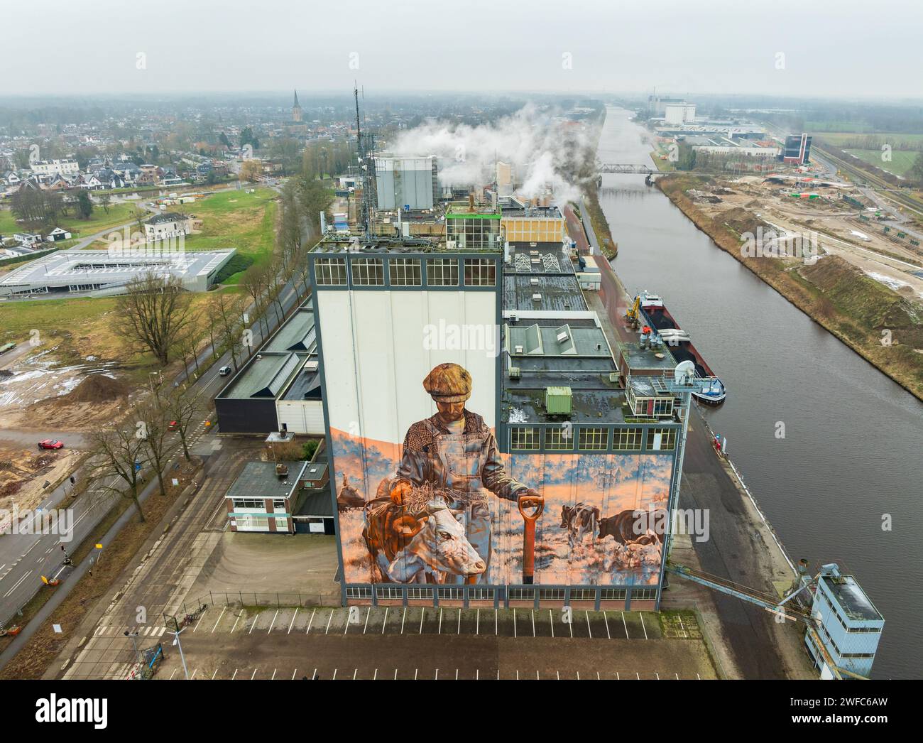 LOCHEM, NETHERLANDS - JANUARY 20, 2024: Artwork on a large building as part of the Achterhoek  Silo Art Tour, whereby barns, silos and other agricultu Stock Photo