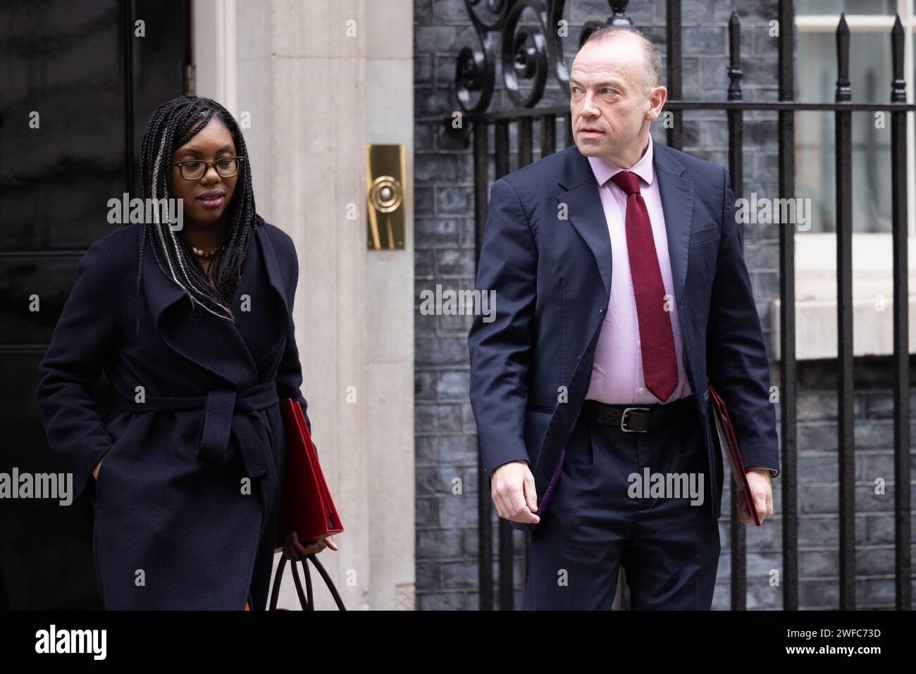 Downing Street, London, UK. 30th January 2024.  Kemi Badenoch MP, Secretary of State for Business and Trade and President of the Board of Trade and Minister for Women and Equalities, and Chris Heaton-Harris MP, Secretary of State for Northern Ireland, attend the weekly Cabinet Meeting at 10 Downing Street. Photo by Amanda Rose/Alamy Live News Stock Photo