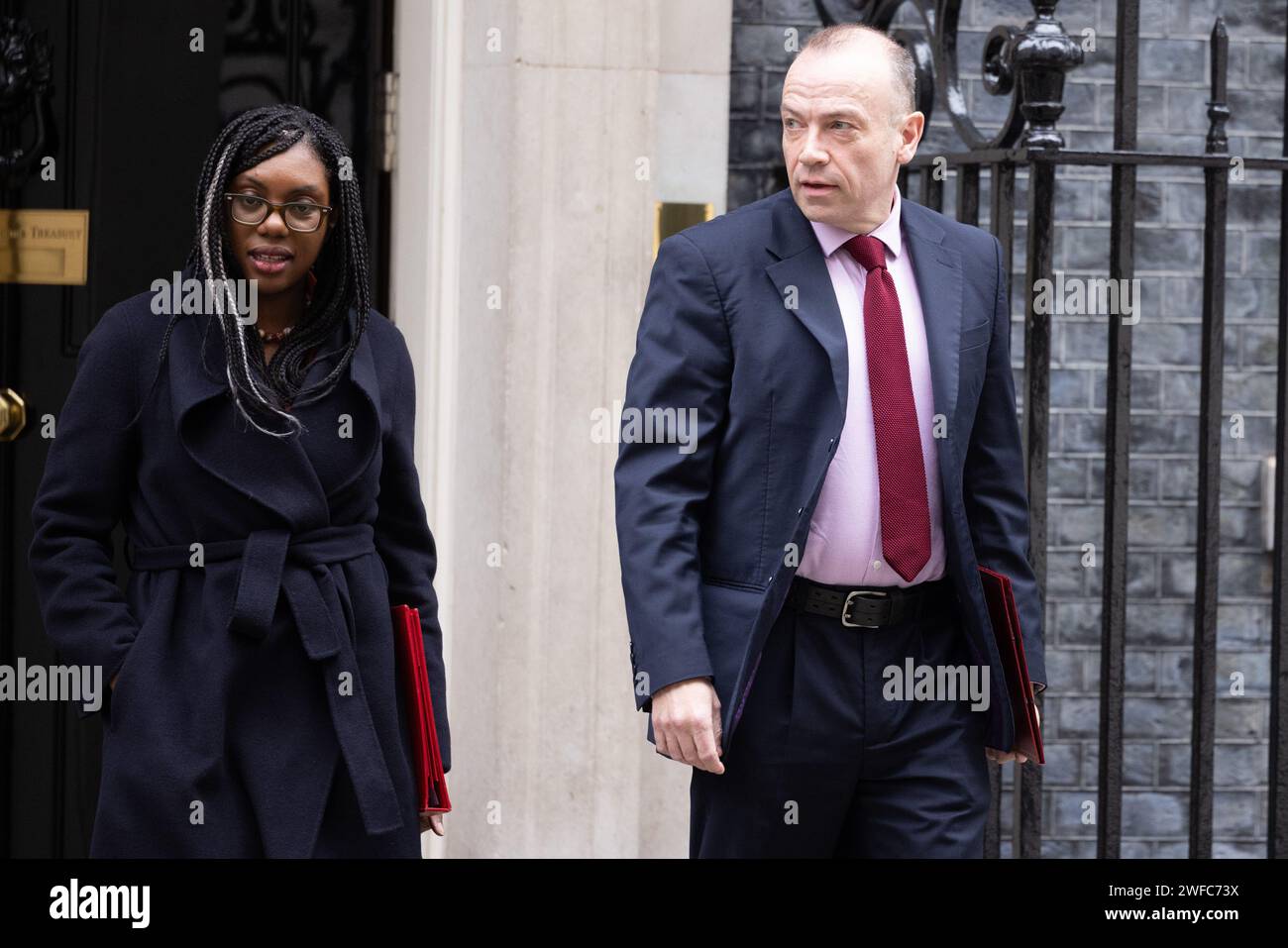 Downing Street, London, UK. 30th January 2024.  Kemi Badenoch MP, Secretary of State for Business and Trade and President of the Board of Trade and Minister for Women and Equalities, and Chris Heaton-Harris MP, Secretary of State for Northern Ireland, attend the weekly Cabinet Meeting at 10 Downing Street. Photo by Amanda Rose/Alamy Live News Stock Photo