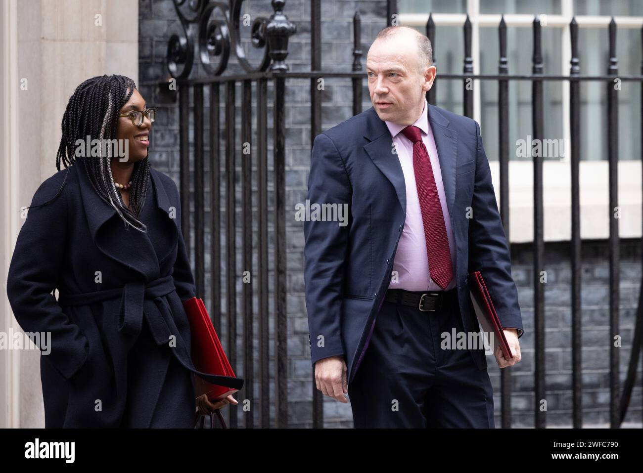 Downing Street, London, UK. 30th January 2024.  Kemi Badenoch MP, Secretary of State for Business and Trade and President of the Board of Trade and Minister for Women and Equalities, and Chris Heaton-Harris MP, Secretary of State for Northern Ireland, attend the weekly Cabinet Meeting at 10 Downing Street. Photo by Amanda Rose/Alamy Live News Stock Photo