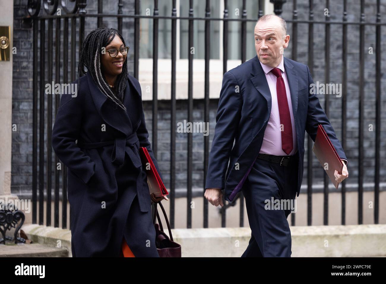 Downing Street, London, UK. 30th January 2024.  Kemi Badenoch MP, Secretary of State for Business and Trade and President of the Board of Trade and Minister for Women and Equalities, and Chris Heaton-Harris MP, Secretary of State for Northern Ireland, attend the weekly Cabinet Meeting at 10 Downing Street. Photo by Amanda Rose/Alamy Live News Stock Photo