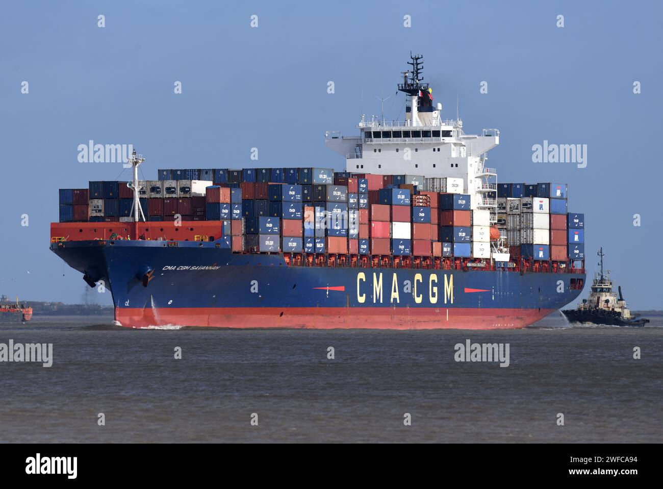 Buffeted by 20mph winds Svitzer tugs bring container ship CMA CGM ...