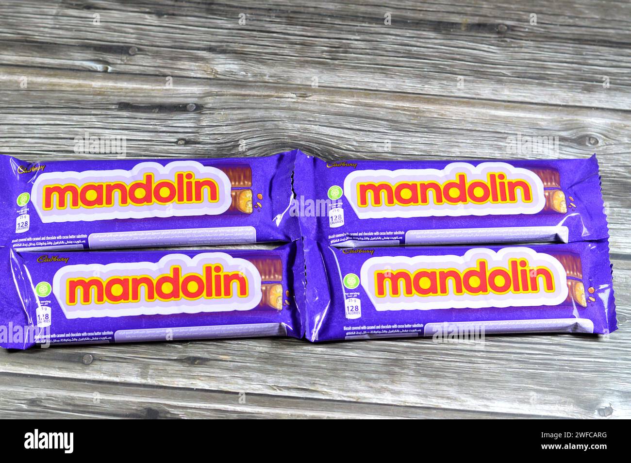 Cairo, Egypt, January 25 2024: Mandolin Biscuit Covered with Caramel and Chocolate, Cadbury Mandolin bars with Ingredients of sugar, caramel and cocoa Stock Photo