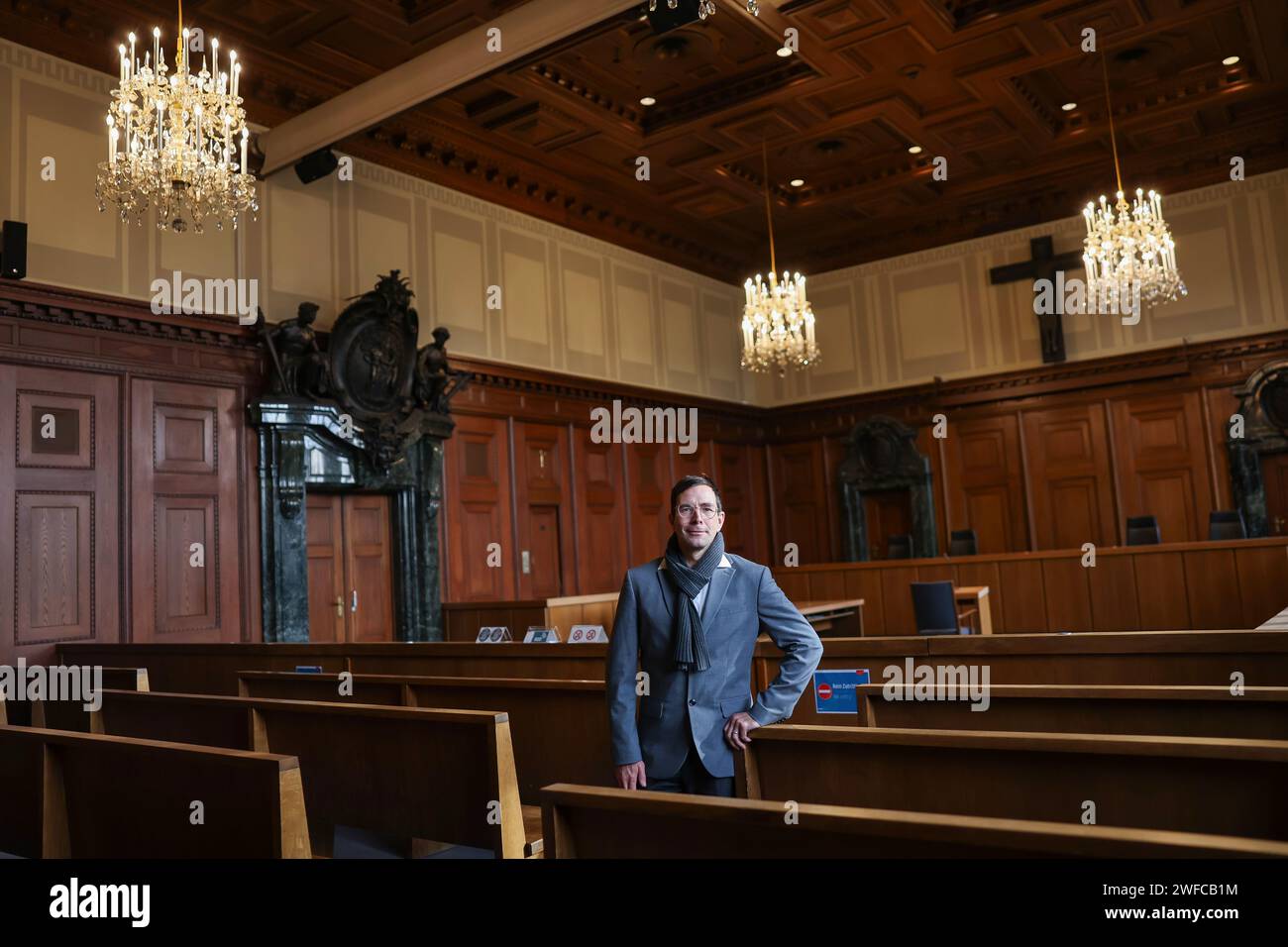 Nuremberg, Germany. 30th Jan, 2024. Alexander Korb, new director of the Nuremberg Trials Memorium, stands in room 600 of the Nuremberg courthouse. Korb will take over the management of the Nuremberg Trials Memorial from June 1, 2024. The 'main war crimes trial' of the International Military Tribunal against leading representatives of the National Socialist regime took place in Room 600 from November 20, 1945 to October 1, 1946. Credit: Daniel Löb/dpa/Alamy Live News Stock Photo