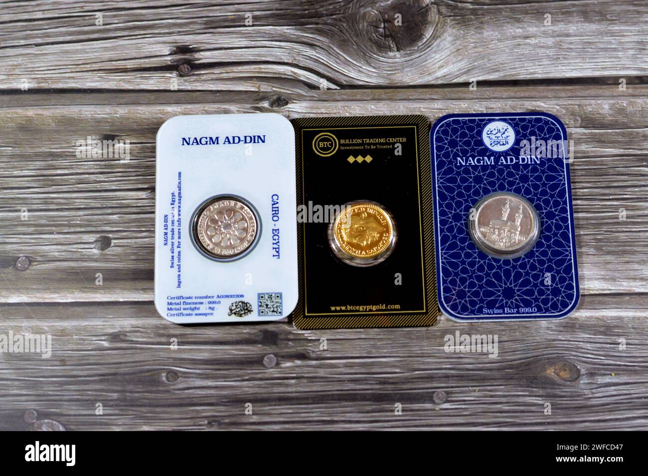 Cairo, Egypt, January 29 2024: BTC Bullion Trading Center gold Egypt  sovereign British gold coin, Nagm Ad-Din Islamic silver pound, Gold and  silver p Stock Photo - Alamy