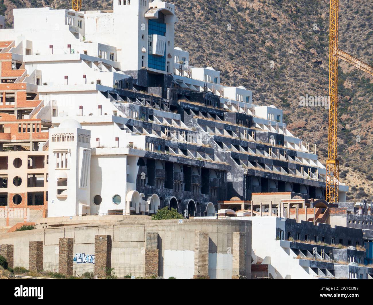 Illegal construction of the abandoned Algarrobico hotel in the natural park of Cabo de Gata in Carboneras, Almeria, Spain. Stock Photo