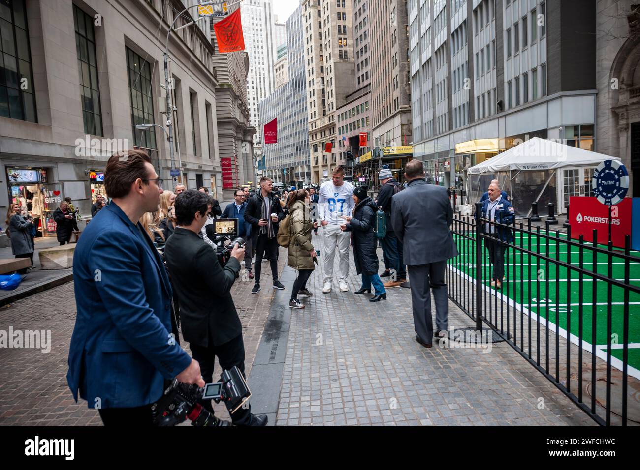 Former American football player Rob Gronkowski, known as “Gronk” greets fans and passer-by in front of the the New York Stock Exchange on Monday, January 29, 2024 promoting the listing of Flutter Entertainment. The Ireland based company, formerly Paddy Power Betfair plc, is the owner of a number of online gambling brands including FanDuel in the U.S.(© Richard B. Levine) Stock Photo