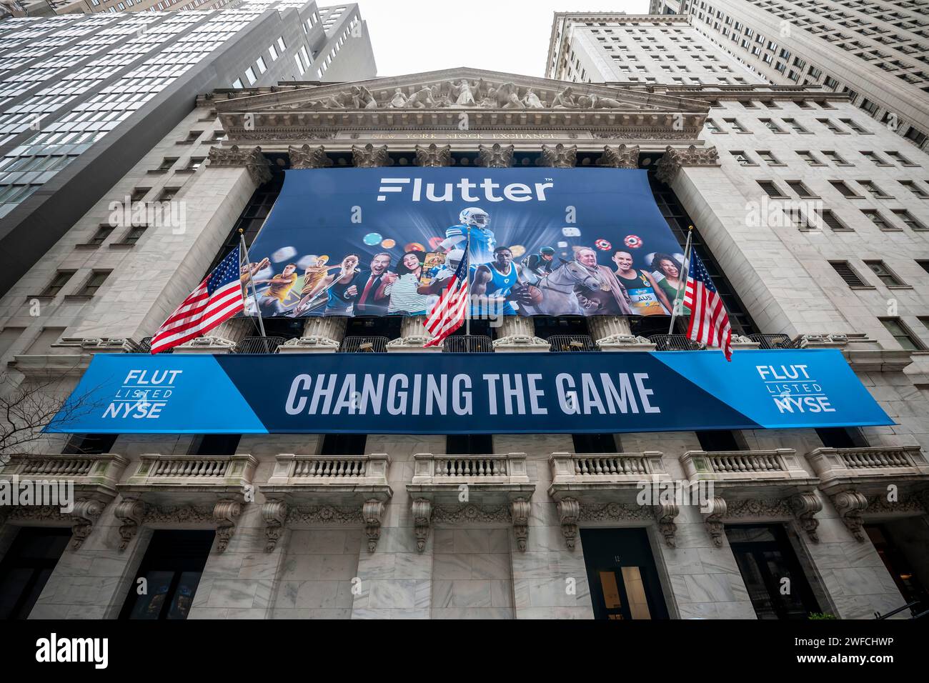The facade of the New York Stock Exchange is decorated on Monday, January 29, 2024 to celebrate the listing of Flutter Entertainment. The Ireland based company, formerly Paddy Power Betfair plc, is the owner of a number of online gambling brands including FanDuel in the U.S.(© Richard B. Levine) Stock Photo