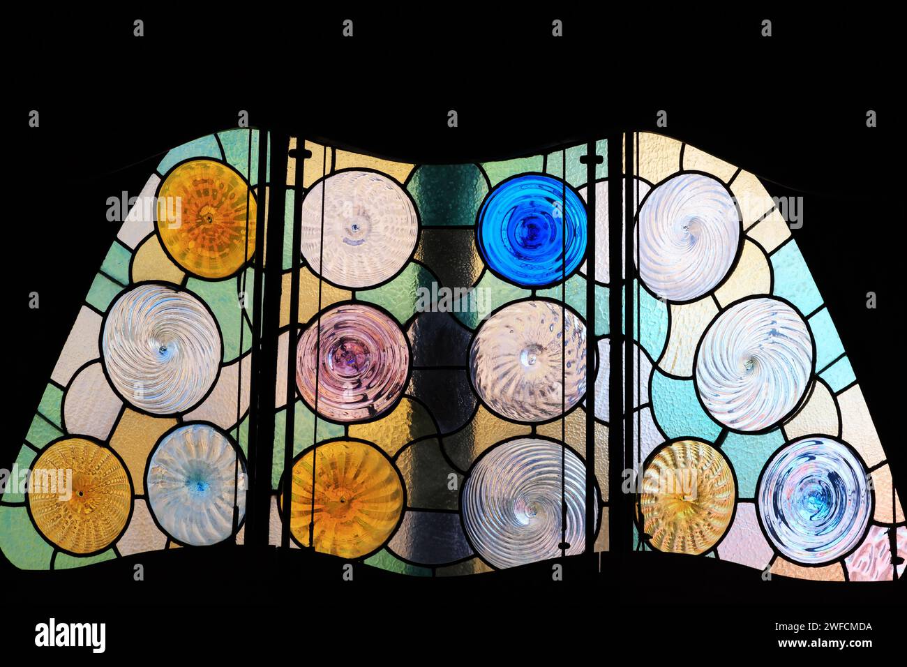 Stained glass window from inside, Casa Batllo, Antonio Gaudi house. Barcelona, Catalunya, Spain Stock Photo